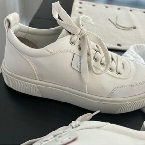 Authentic Christian Louboutin’s tennis shoes, worn one or two times.